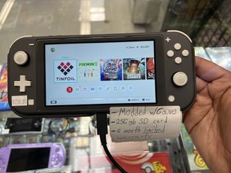 Nintendo Switch Lite w/ Games 256gb