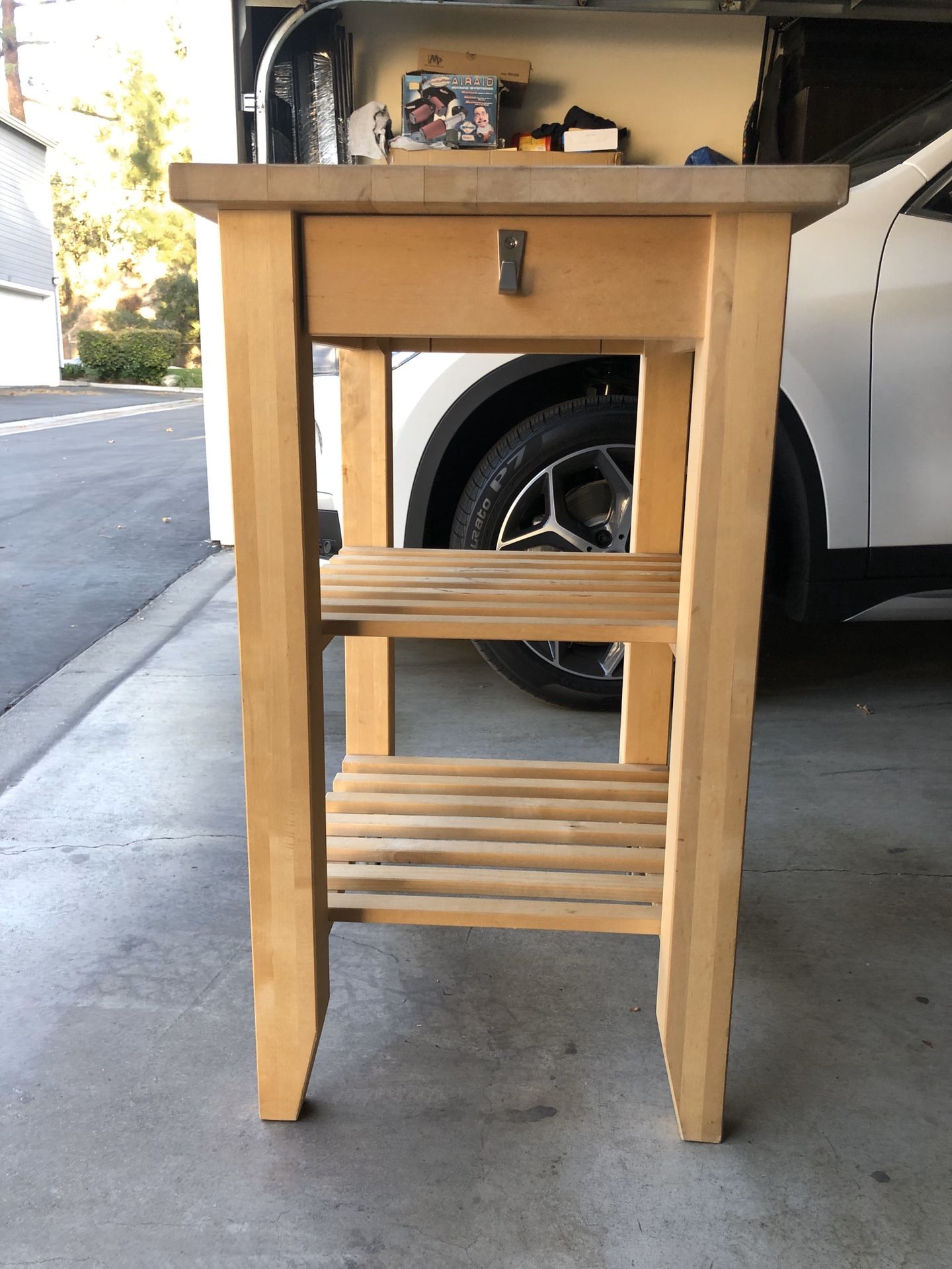Rolling Kitchen Island/Cart with shelves.