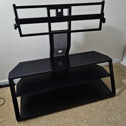 Three-tier metal and glass TV stand with a movable neck mount. Sturdy, modern, and in great condition.