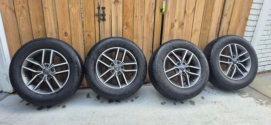 18" Jeep rims and tires for sale $900