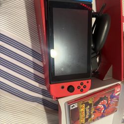 LIGHTLY USED NINTENDO SWITCH + POKEMON SCARLET