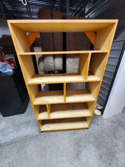 Multi sectional shelf/bookcase