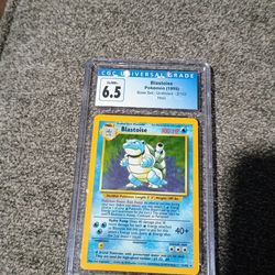 1999 POKEMON BLASTOISE CGC 6.5