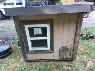 Chicken coop with window and automatic door