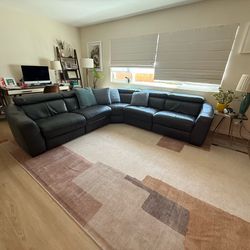 Free! Grey leather sectional with reclining seats.