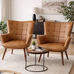 2) Faux leather chairs - beautiful modern chairs