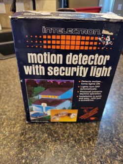 Intelectron vintage Motion Detector with security light, never used, new in package