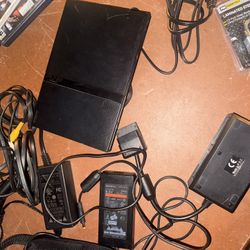 PS2 gaming console +5 games +2 controllers