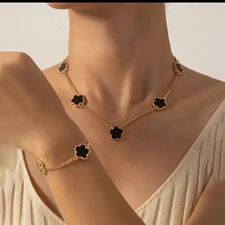 fine black lucky flower designs necklace and bracelet set