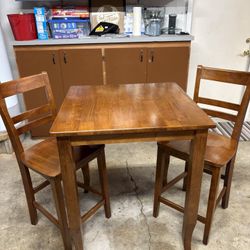 High table and two chairs