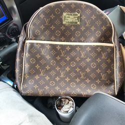 Louis Vuitton Paris Bookbag And Handbag