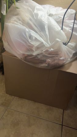 Box and bag full of baby  girl clothes
