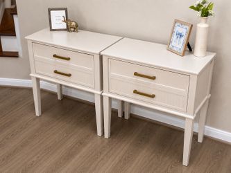 Beige nightstand set with gold hardware