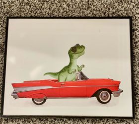 Wall art of a T-REX in a classic red 1957 Chevrolet Bel Air convertible.