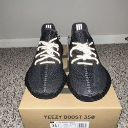 Black Yeezy non reflective size 11.5