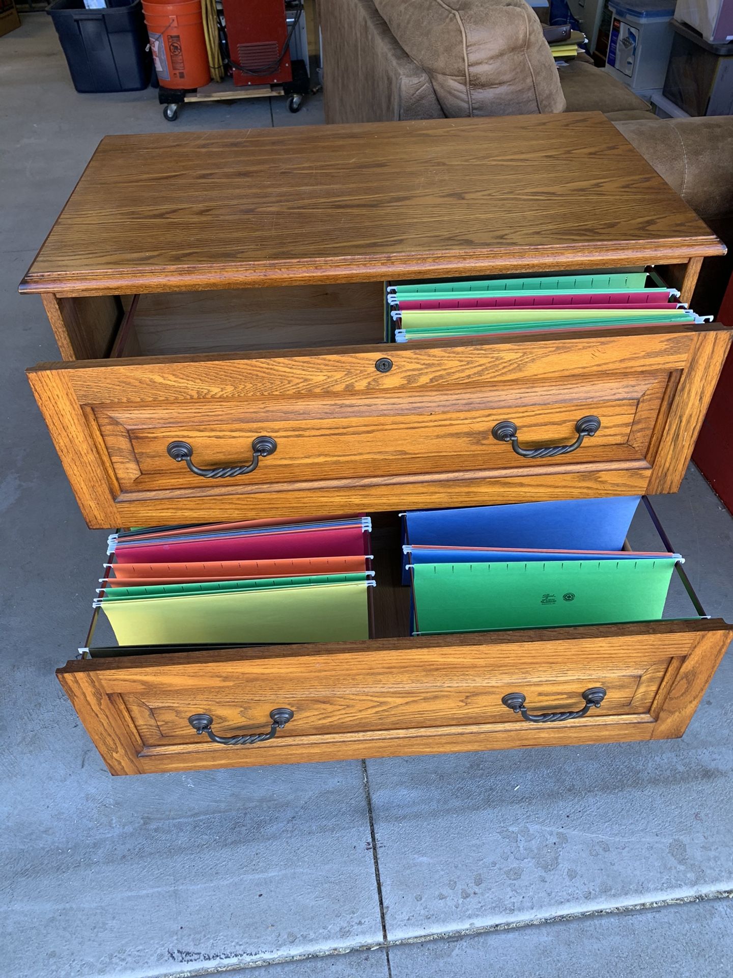 Oak lateral file cabinet. Legal or letter sized