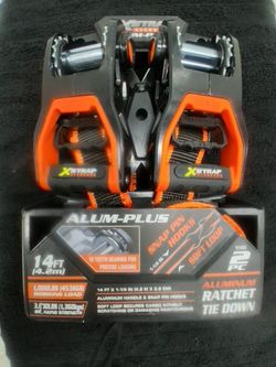 NEW IN THE PACKAGE, HEAVY DUTY, RATCHET "X STRAPS" TIE DOWN STRAPS PRICED TO SELL!!!
