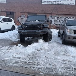 2013 Jeep Wrangler Unlimited Sahara – Lifted – 120k Miles – MD Inspected – Rebuilt Title