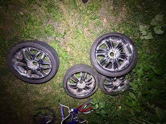 Four 20” Rims and Tires