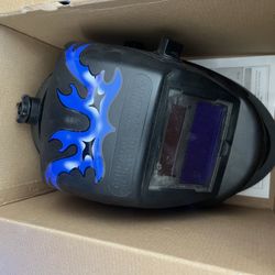 Auto darkening welding hood 