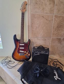 Fender guitar, AMP + T.v cord
