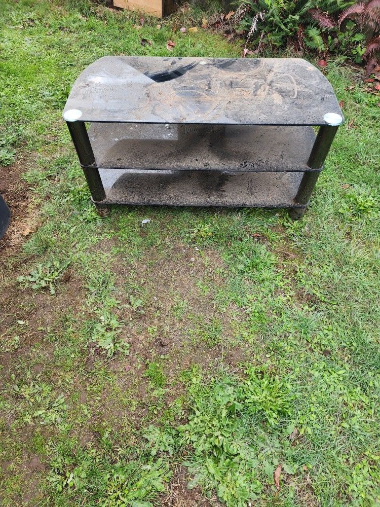 Black glass TV Stand. Dimensions in pictures
