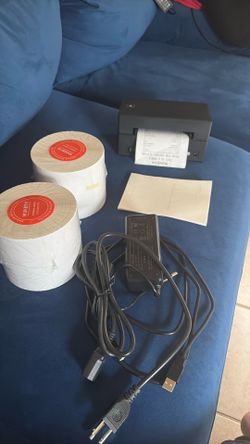 Label printer with brand new rolls of printer paper