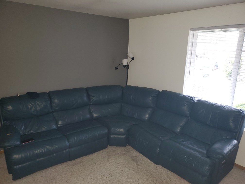 Sectional couch with reclining chairs