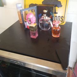 PERFUMES! JIMMY CHOO, MICHEAL KORS, DOLCE AND GABANNA, AND NIKI MANAJ, AND COACH .....