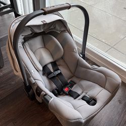 Nuna Infant Car Seat + Base (Neutral Gray/Tan) – Great Condition