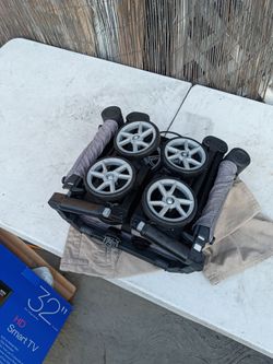 Folded munchkin baby stroller
