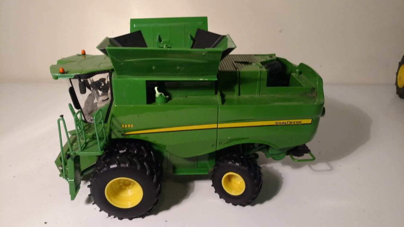 John Deere toy harvesting tractor rolling mobile