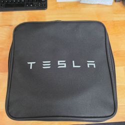 Tesla's mobile charger with all adapters