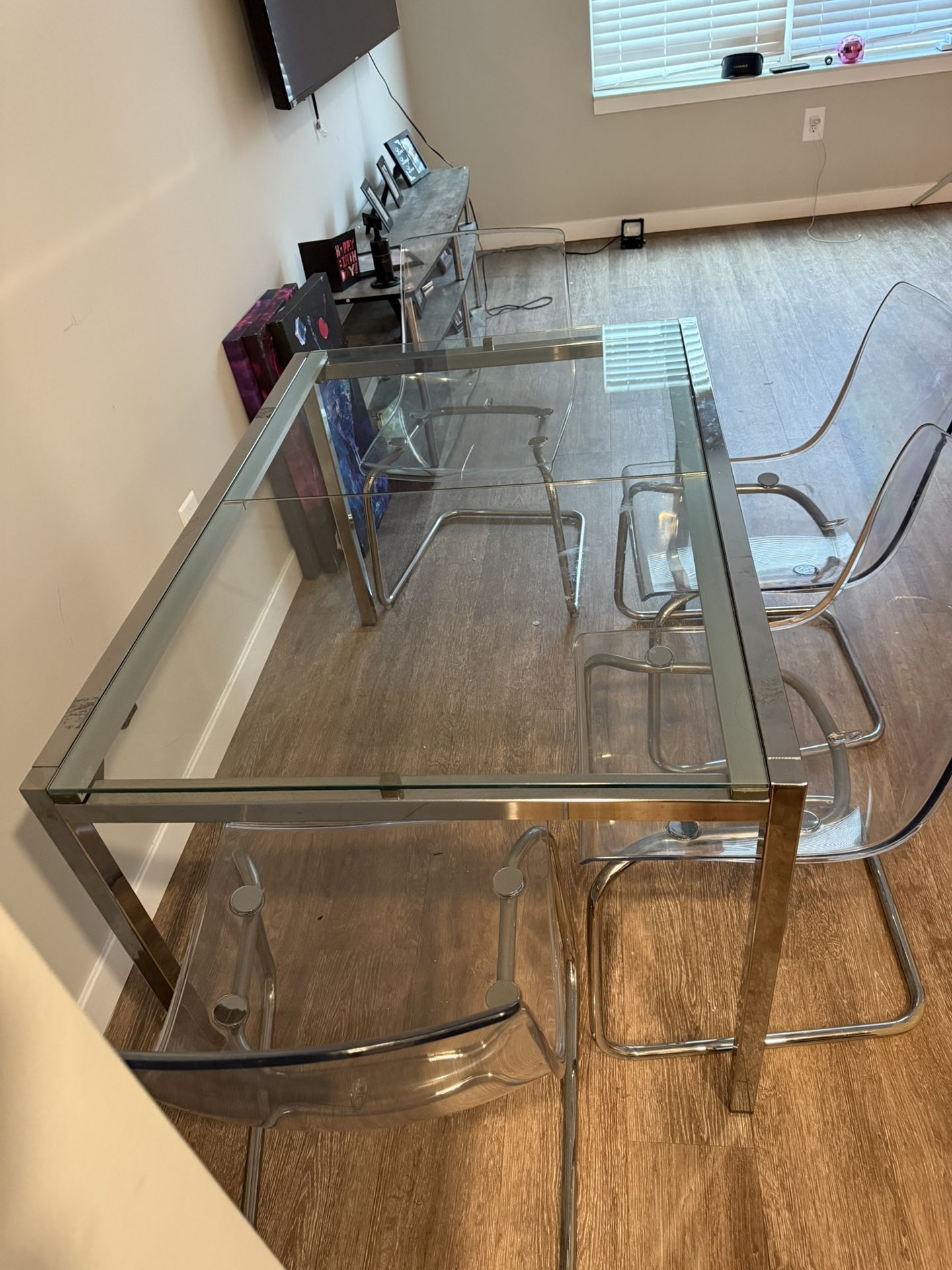 Glass Table And Clear Chairs