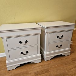 2 Clean and Nice White Two Drawer Nightstands