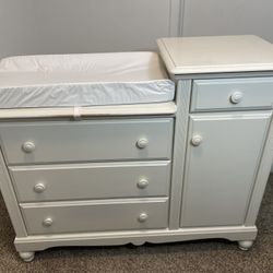 White baby diaper/dress changing station