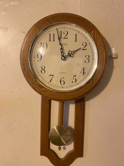 A brown and wood clock!