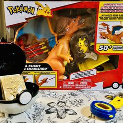 Pokémon Lot: Rare 1998 Virtual Pet Pocket Pikachu, 1999 Burger King Pokemon Gold Bars, Charizard Toy