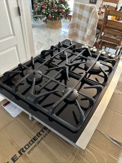 GE Profile 30"Gas Glass Cooktop 4 Burners Side Stainless Steel Knobs JGP940SEK2SS