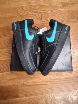 Nike Air Force 1 black and cyan.