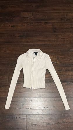 white zip up shirt