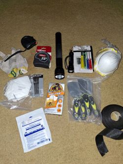 Lot of mixed tools. 
 And  1 clear gorilla gule.
 2 Flashlights.
1  Simone Tools Pocket  Holster
15 construction mask.
And many more