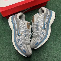 NIKE P-6000 METALLIC SILVER AEGEAN STORM SIZE 9.5
