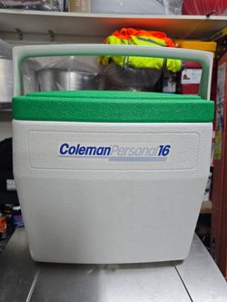 vintage Coleman Personal 16 Model 5274 16-quart hard cooler with a white body, a bright green lid, and a wraparound handle.