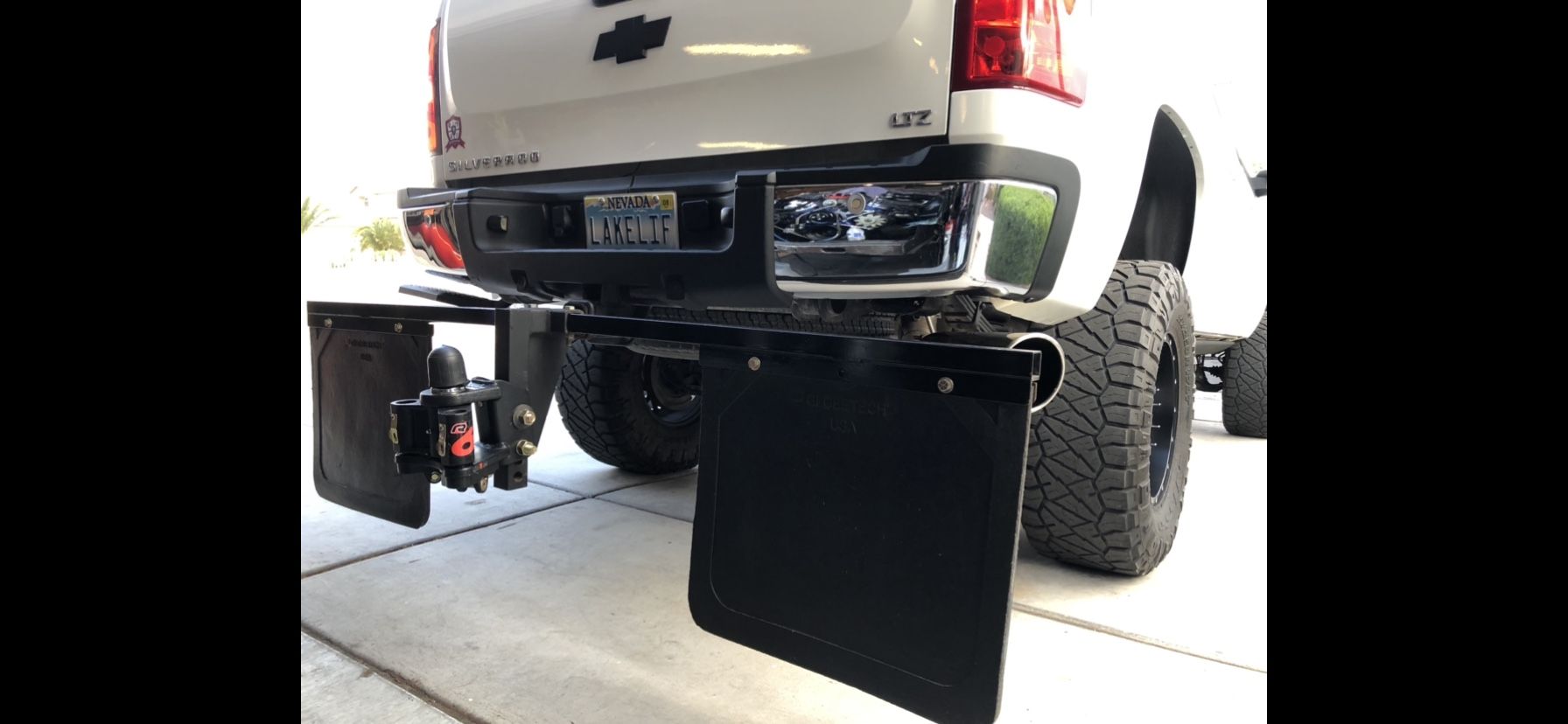 Custom drop hitch with rock/mud guards