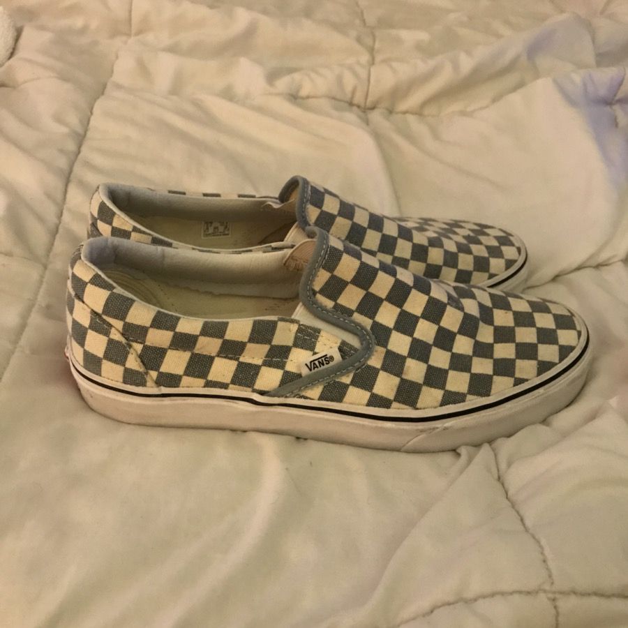 Pair of white-and-blue slip on shoes