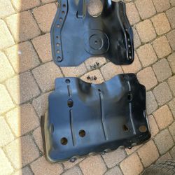In Upland 91784.  Front And Rear radiator Engine Oil Pan OEM stock Stock Skid Plate & Bolts 1st Gen Tacoma 3rd Gen 4runner in Great Condition Toyota $