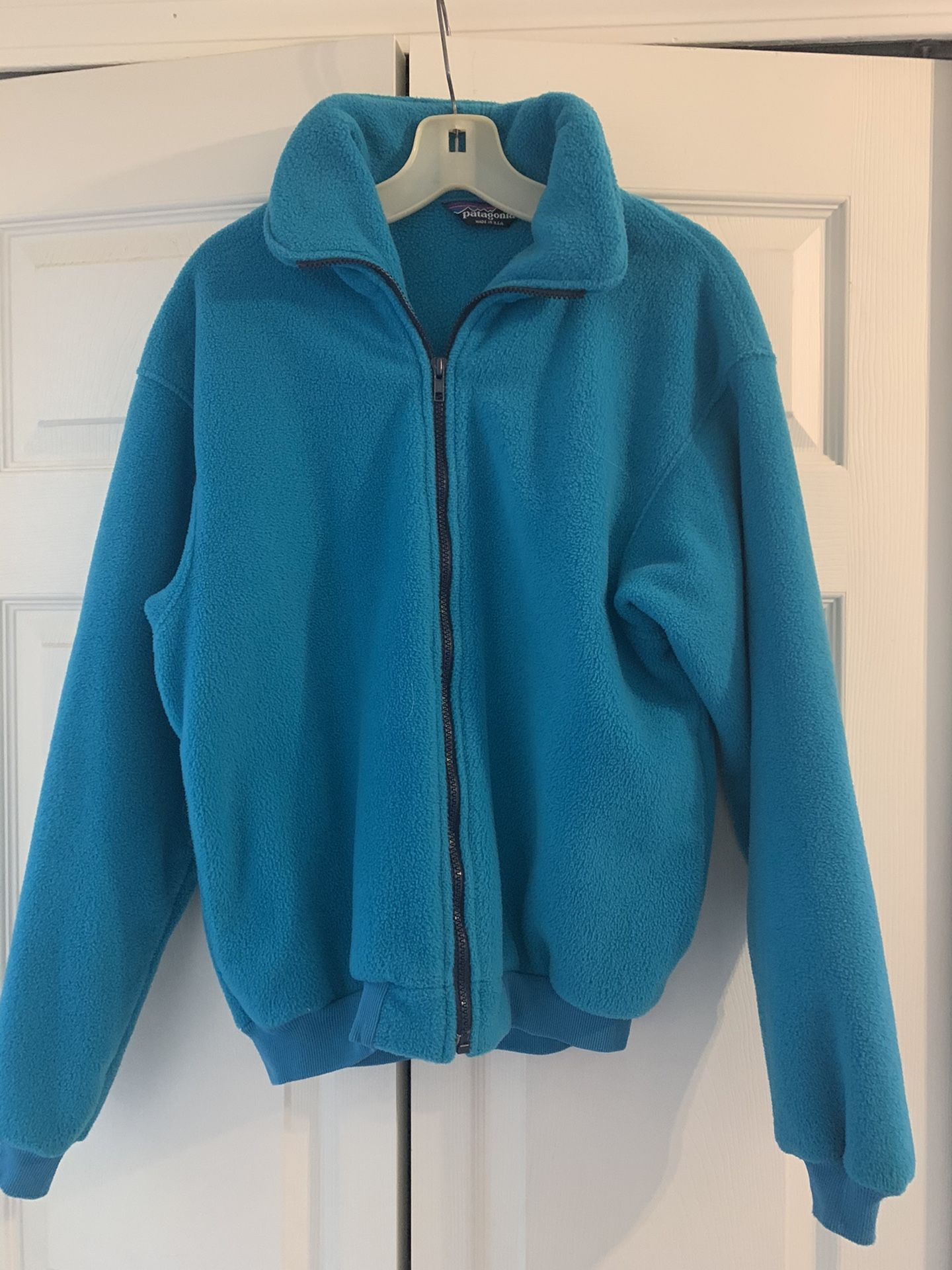 Patagonia turquoise blue fleece jacket