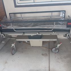 GURNEY / BED ON WHEELS
