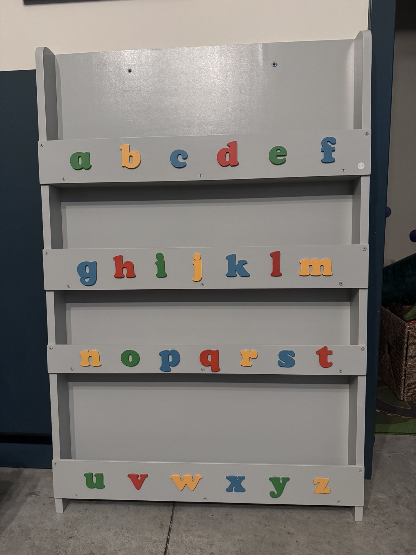 Space saving wall bookcase with alphabet 77D x 7W x 115H centimetres